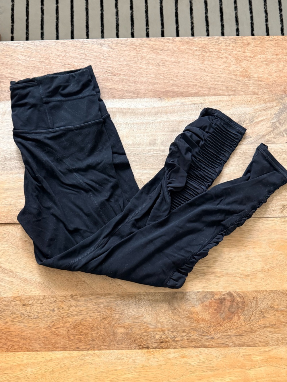 Athleta Bakasana tight in Powervita with Ruched mesh Calf Leggings - black